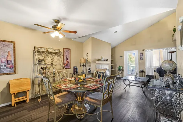 a bedroom with furniture fireplace and a window