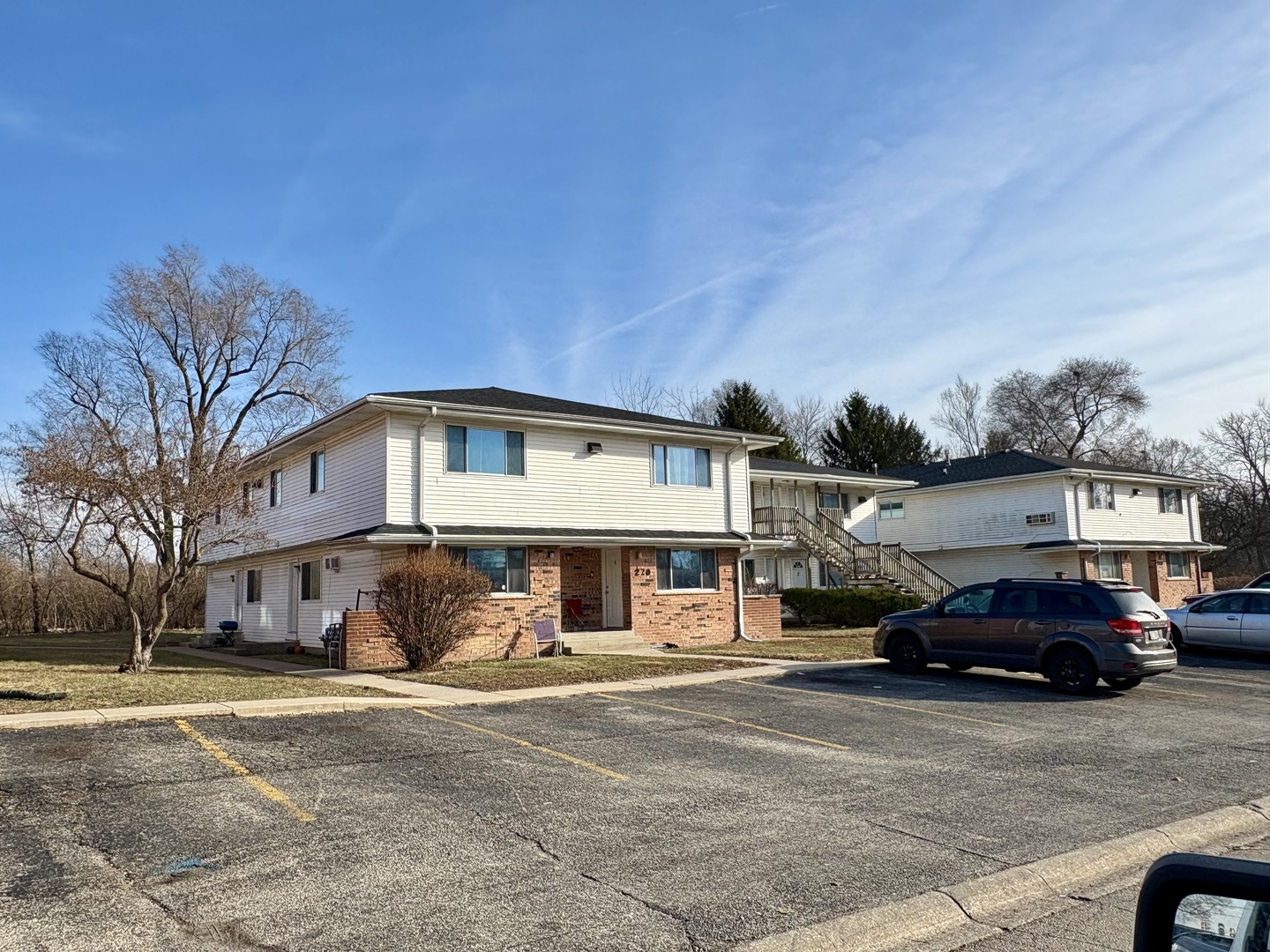 210-280 Tedmark Court Kankakee, IL 60901 - Photo 7 of 11 a car parked in front of a building