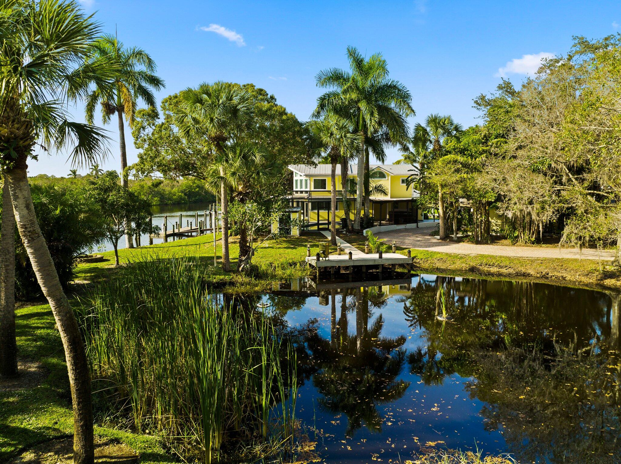 611 Southwest Timber Trail Stuart, FL 34997 - Photo 46 of 56 Stocked Pond