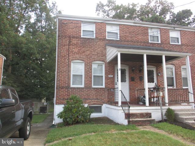 1615 Naturo Road Towson, MD 21286 - Photo 1 of 15 All brick semi detached, covered porch, & driveway