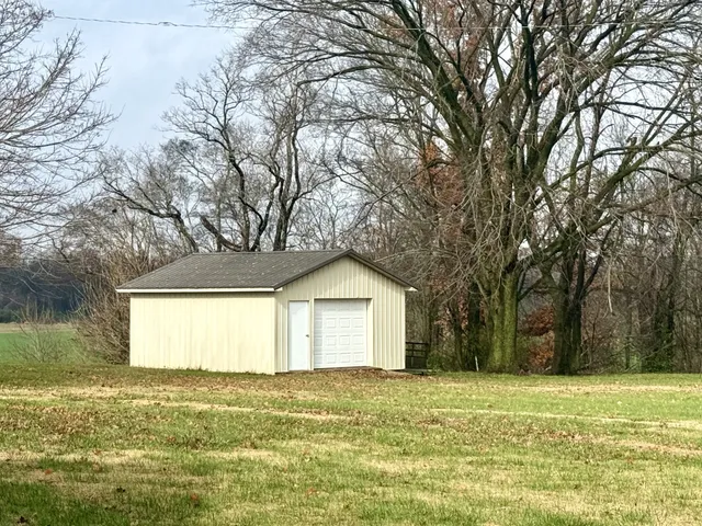 a view of an ocean and a yard
