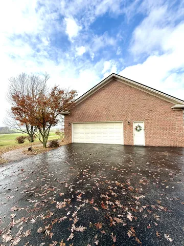 a backyard of a house with trees