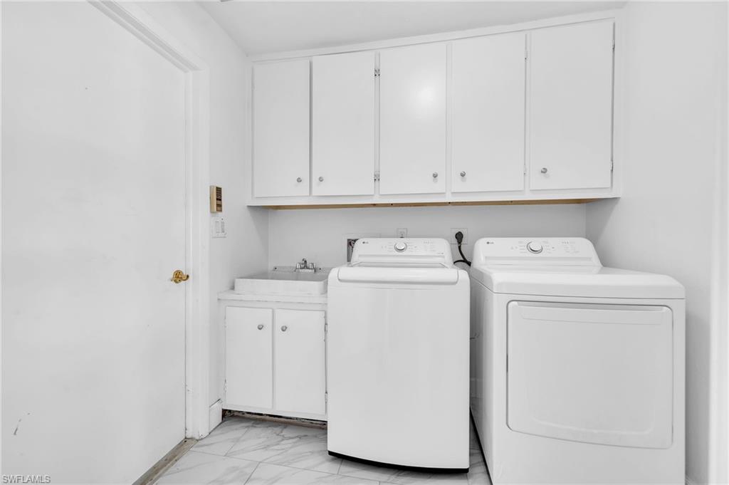3065 50th Lane Southwest Naples, FL 34116 - Photo 20 of 31 a utility room with dryer and washer
