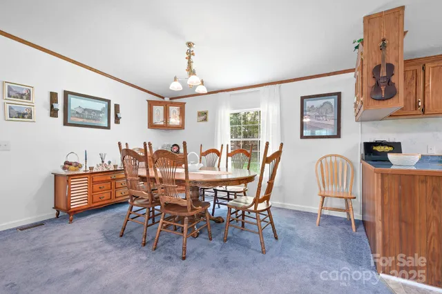 a view of a dining room with furniture
