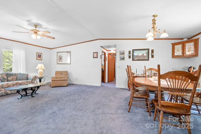 a view of a livingroom and dining room
