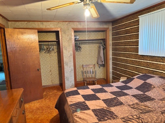 5226 Blood Road Marienville, PA 16239 - Photo 15 of 44 a bedroom with a bed and a walk in closet