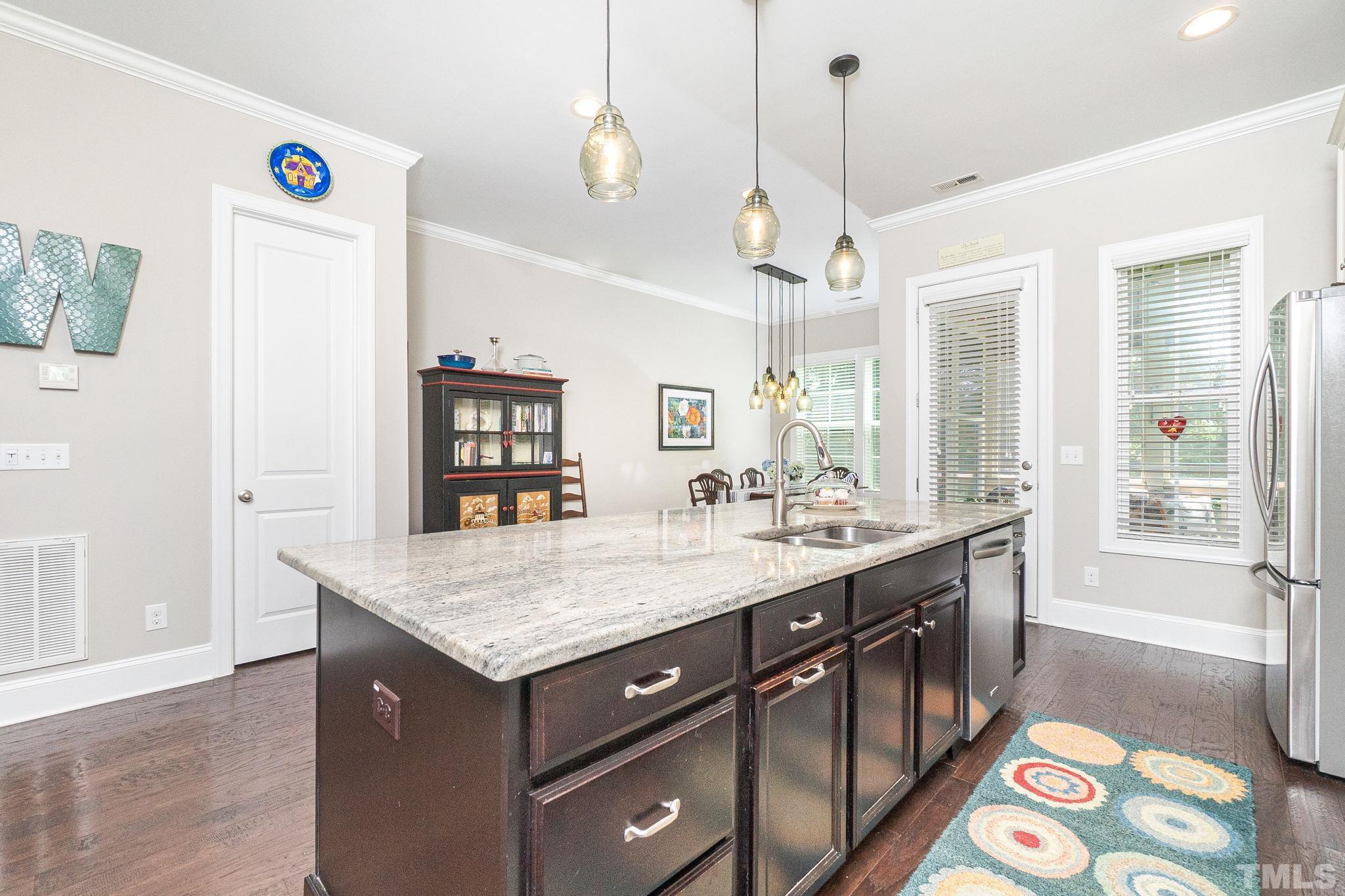 129 Penley Circle Raleigh, NC 27609 - Photo 20 of 43 a bathroom with a sink a large mirror and a shower
