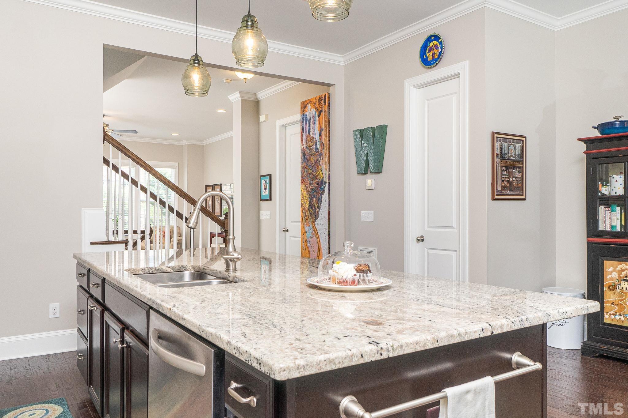 129 Penley Circle Raleigh, NC 27609 - Photo 23 of 43 a dining table with chairs and wooden floor