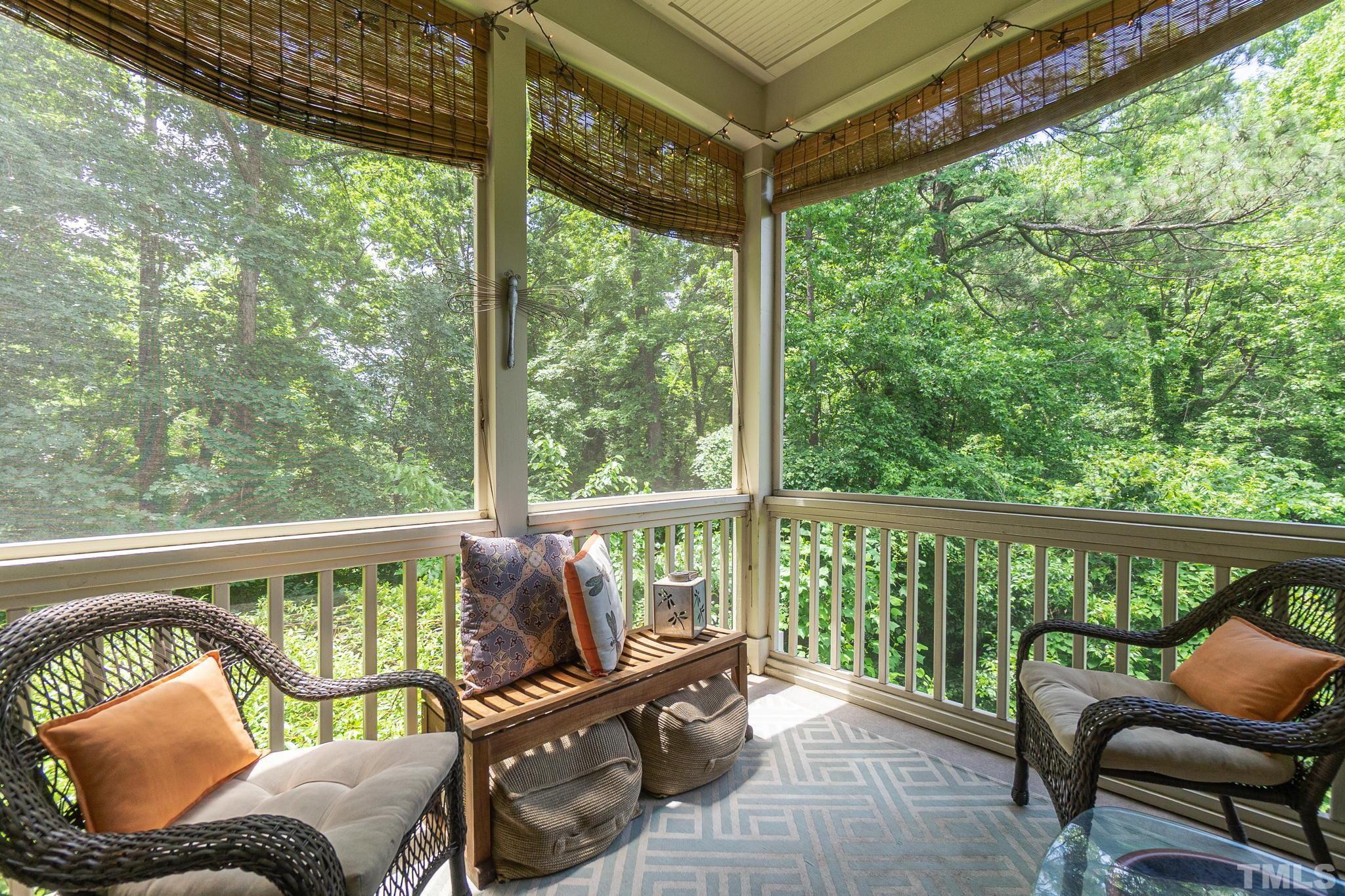 129 Penley Circle Raleigh, NC 27609 - Photo 24 of 43 a view of a chair and tables in the balcony