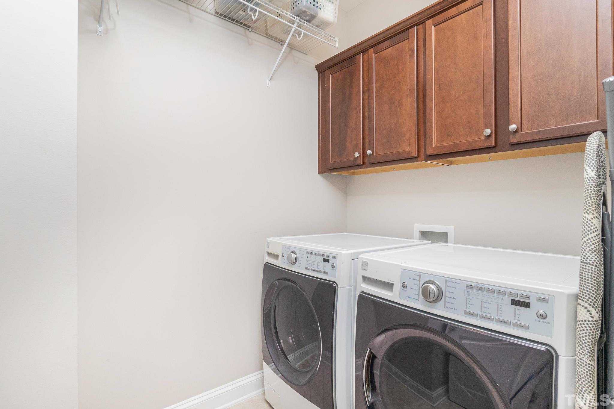 129 Penley Circle Raleigh, NC 27609 - Photo 28 of 43 a utility room with dryer and washer