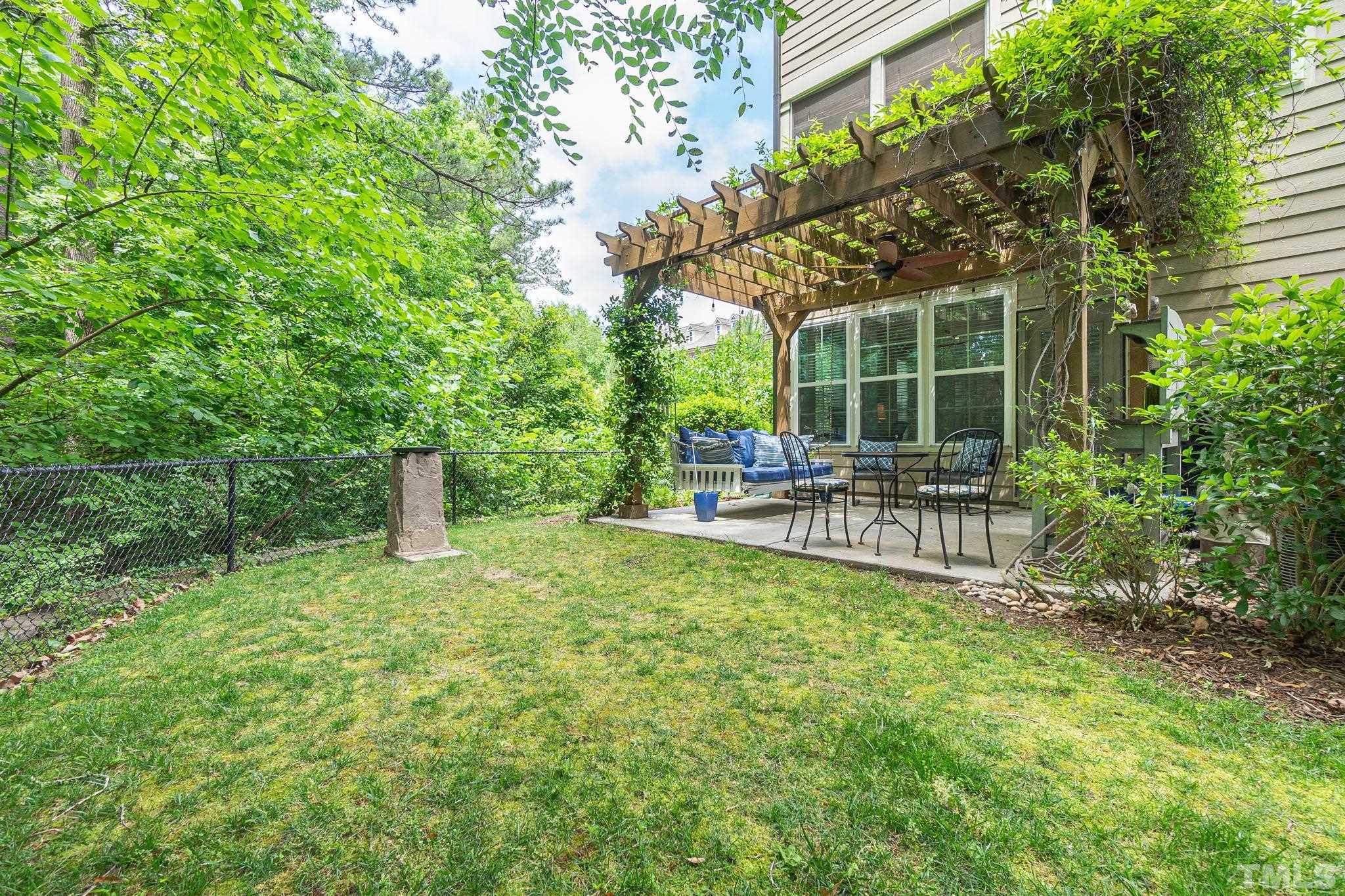 129 Penley Circle Raleigh, NC 27609 - Photo 36 of 43 a garden view with a seating space