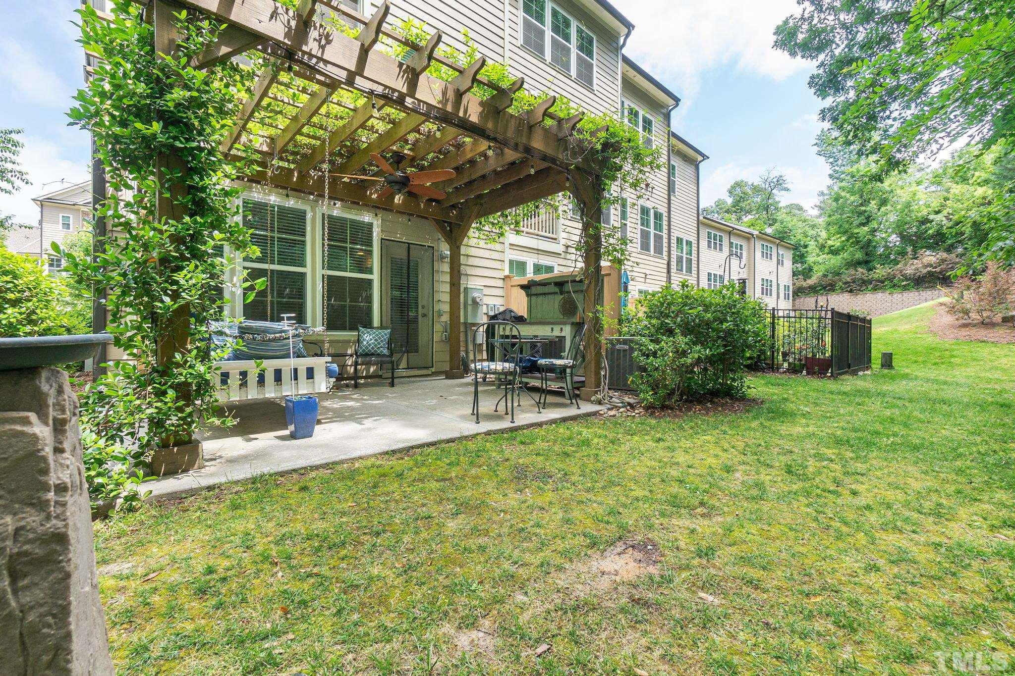 129 Penley Circle Raleigh, NC 27609 - Photo 38 of 43 a house view with sitting space and garden space
