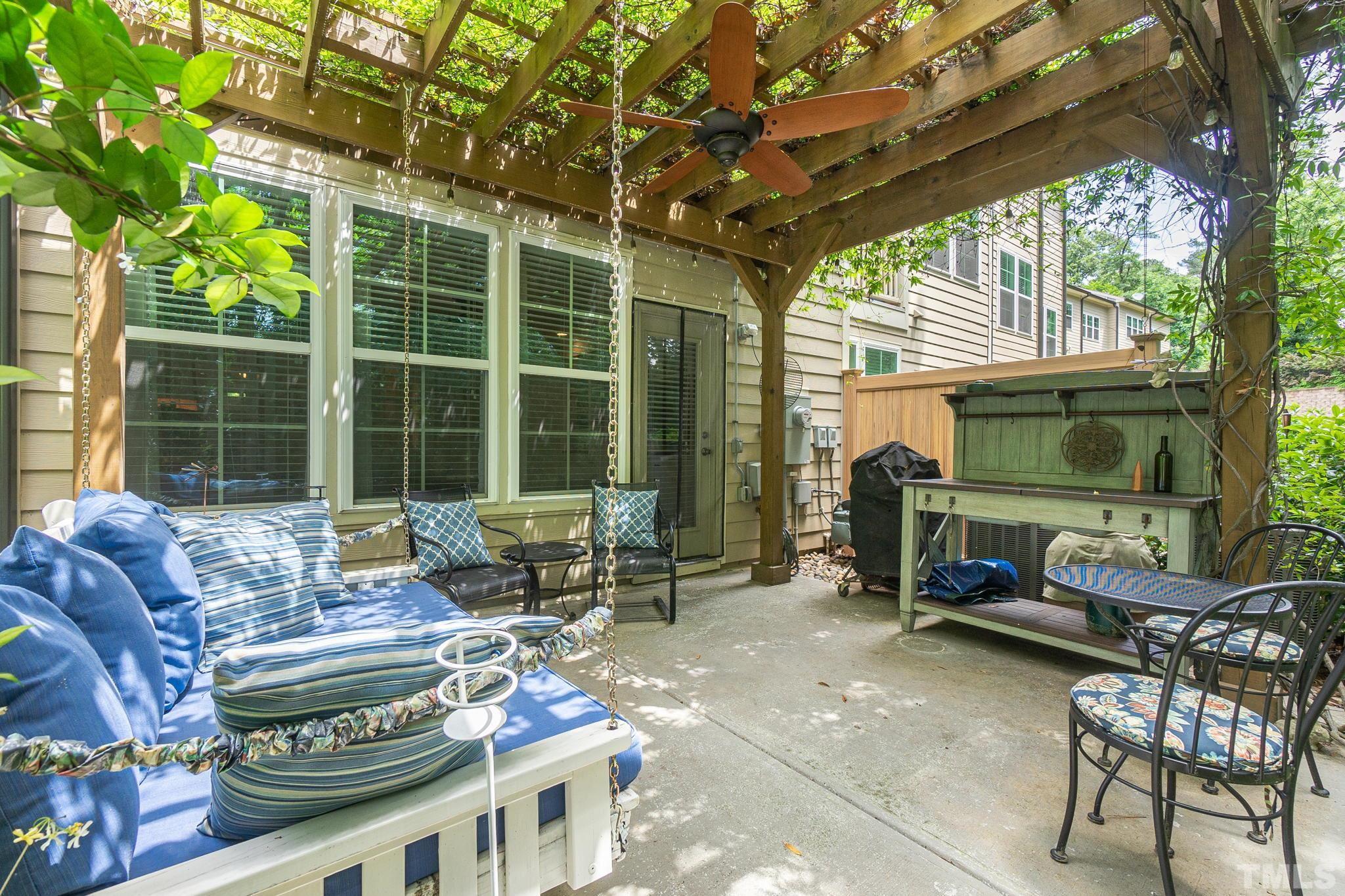 129 Penley Circle Raleigh, NC 27609 - Photo 40 of 43 a bedroom with furniture and a large window