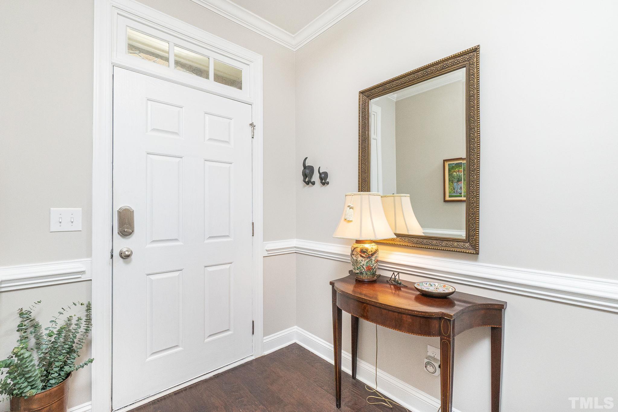 129 Penley Circle Raleigh, NC 27609 - Photo 4 of 43 a bathroom with a sink and a mirror