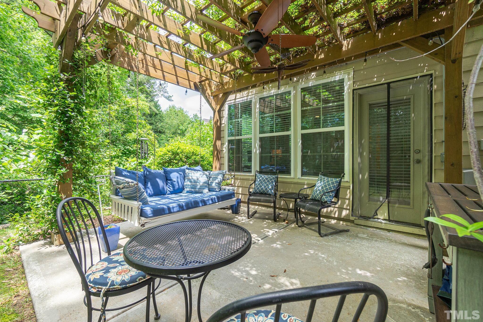 129 Penley Circle Raleigh, NC 27609 - Photo 41 of 43 a backyard of a house with outdoor seating