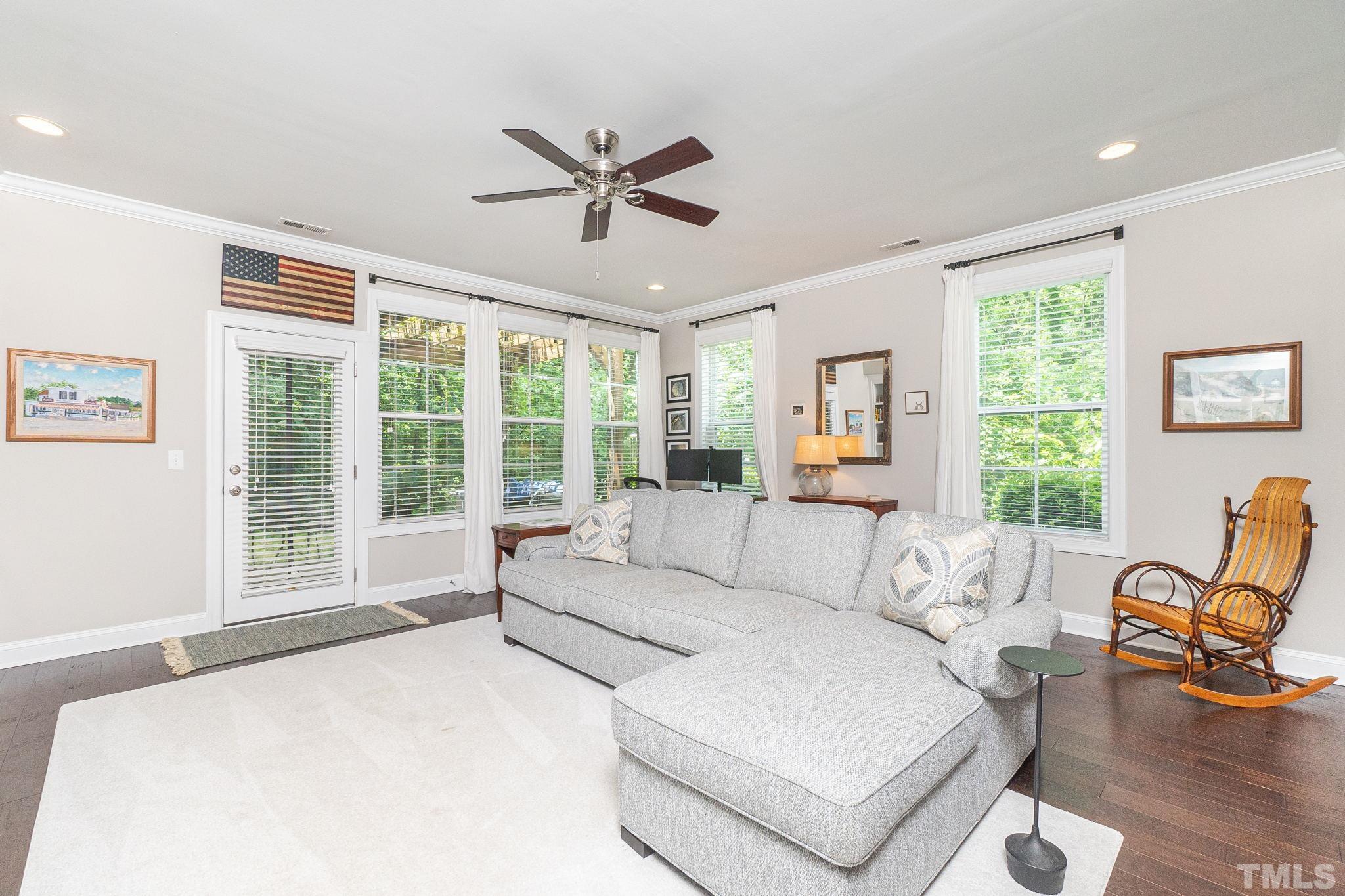 129 Penley Circle Raleigh, NC 27609 - Photo 5 of 43 a living room with furniture and a large window