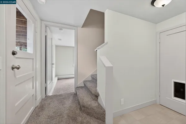 a view of a hallway with entryway
