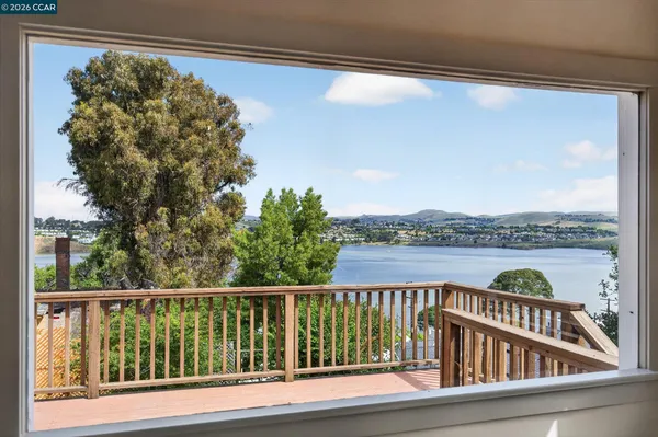 a view of a balcony with lake view