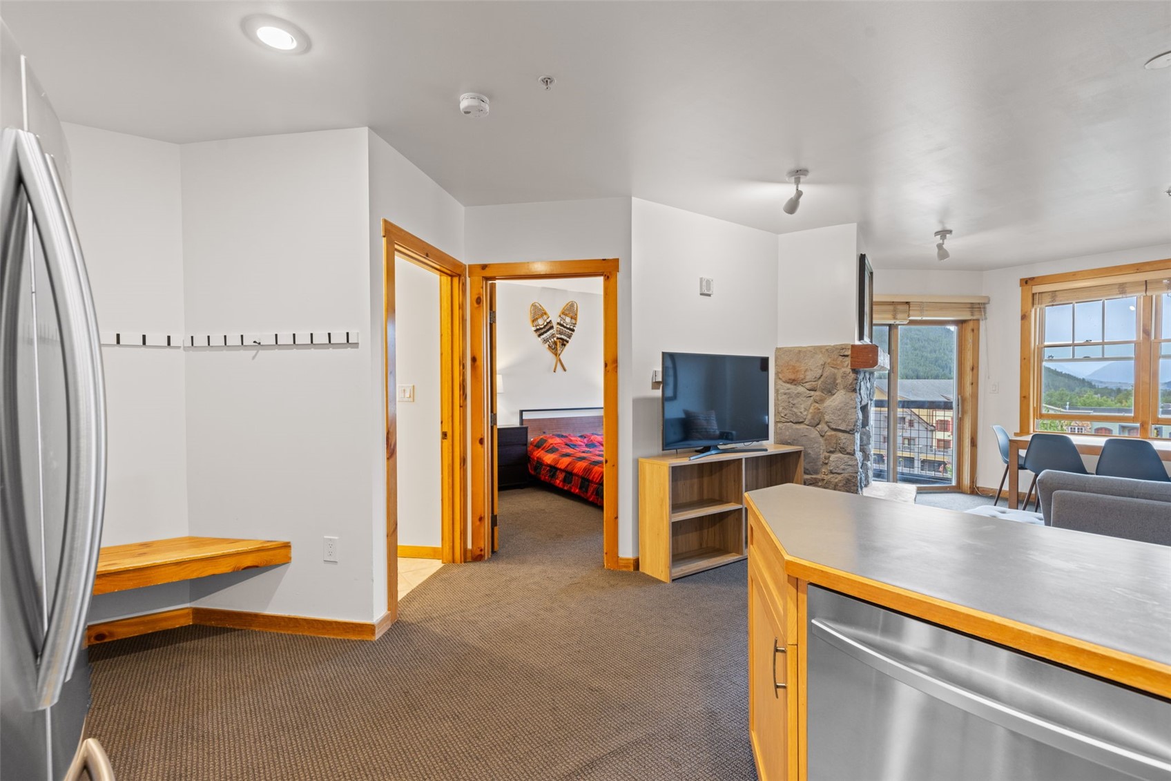 100 Dercum Square, Unit 8394 Keystone, CO 80435 - Photo 19 of 50 Kitchen featuring carpet and stainless steel refrigerator