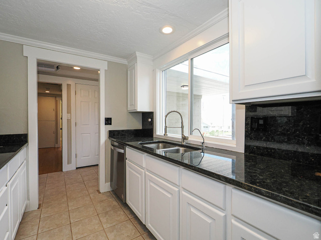 154 East 3000th Street South Bountiful, UT 84010 - Photo 2 of 37 Kitchen featuring white cabinetry, dark stone countertops, stainless steel sink with gooseneck faucet, and recessed lighting