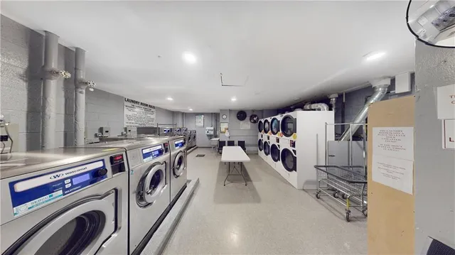 a view of a storage & utility room with washer and dryer