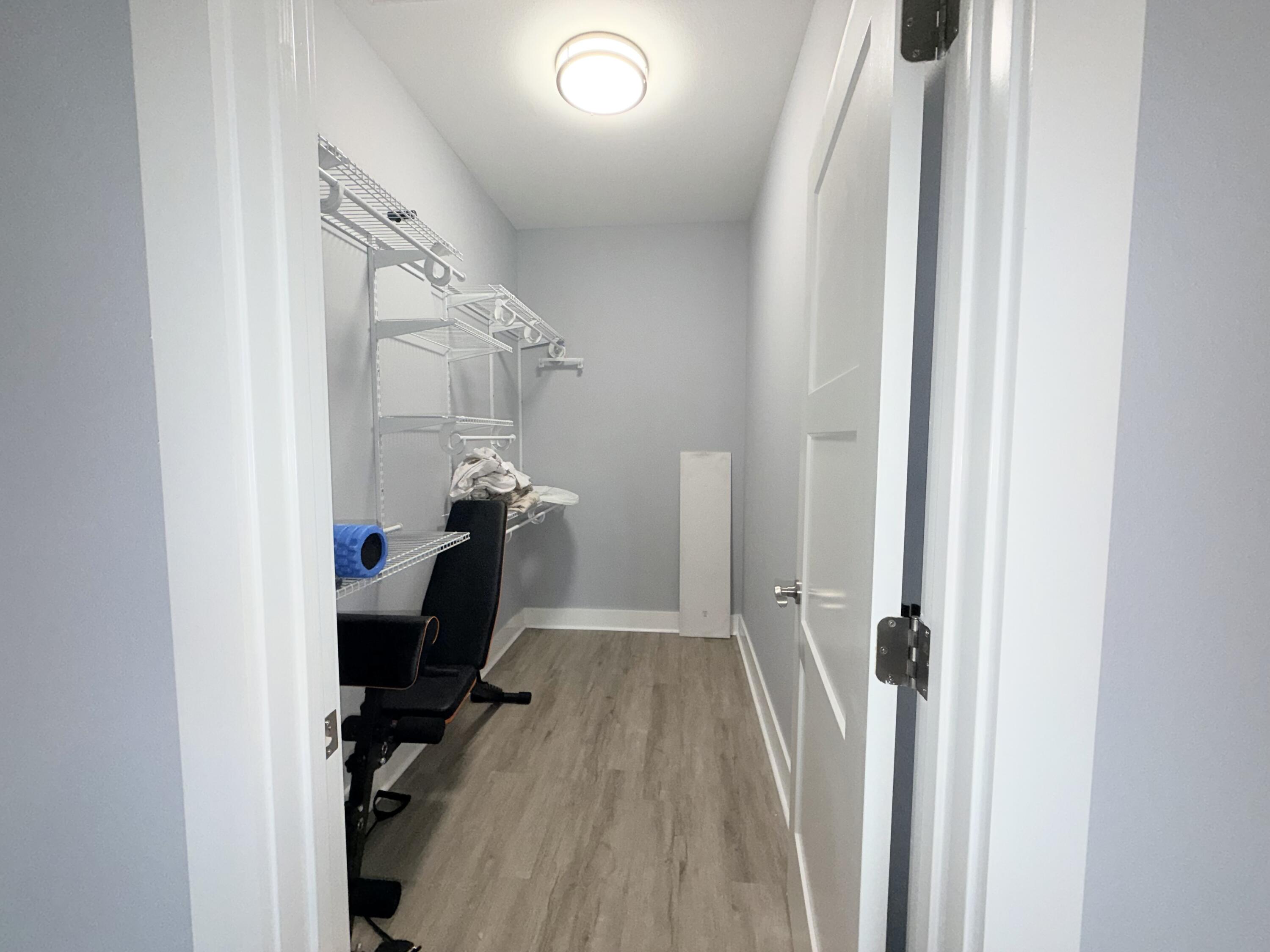 122 Loblolly Circle Midway, FL 32343 - Photo 24 of 38 a view of a room with gym equipment
