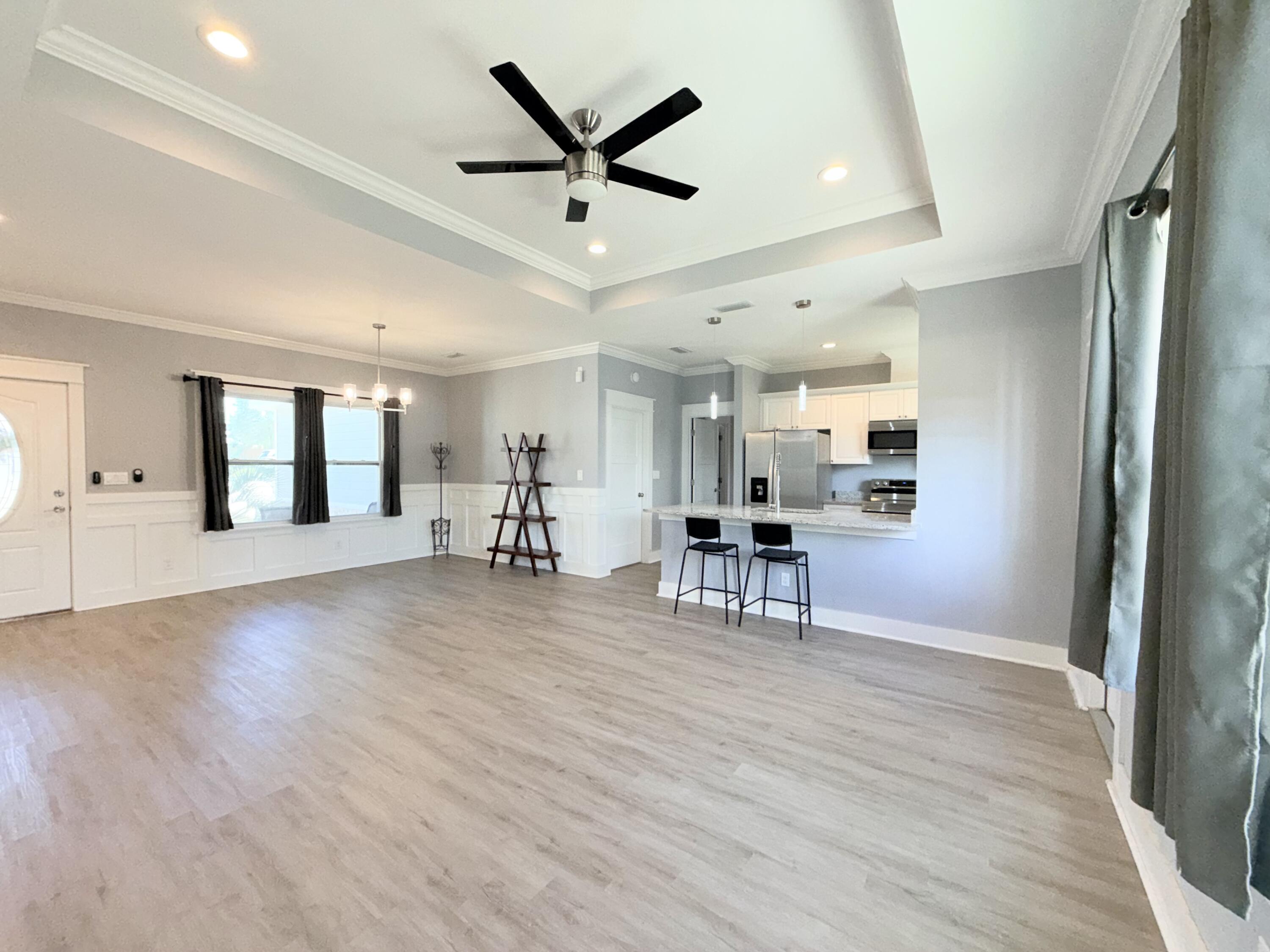 122 Loblolly Circle Midway, FL 32343 - Photo 9 of 38 a view of a livingroom with furniture and hardwood floor
