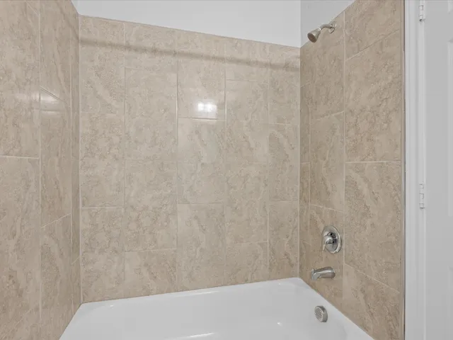 a bathroom with a bathtub