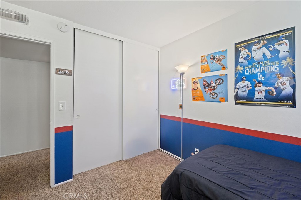 329 Surry Court Brea, CA 92821 - Photo 20 of 47 a bedroom with a bed and painting on the wall