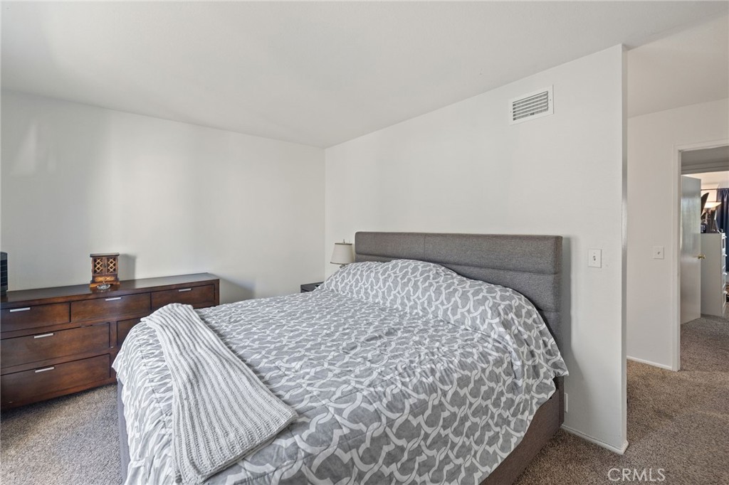329 Surry Court Brea, CA 92821 - Photo 25 of 47 a bed sitting in a bedroom next to a window