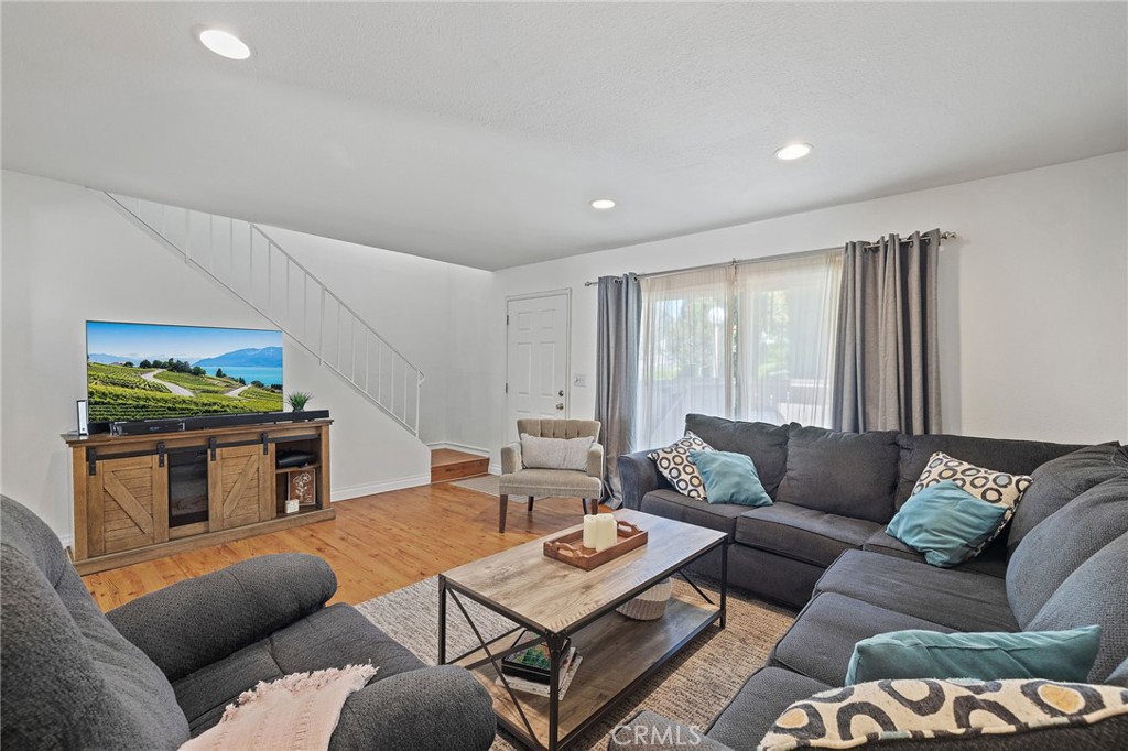 329 Surry Court Brea, CA 92821 - Photo 5 of 47 a living room with furniture and a fireplace