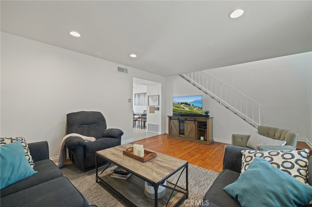 329 Surry Court Brea, CA 92821 - Photo 7 of 47 a living room with furniture and wooden floor