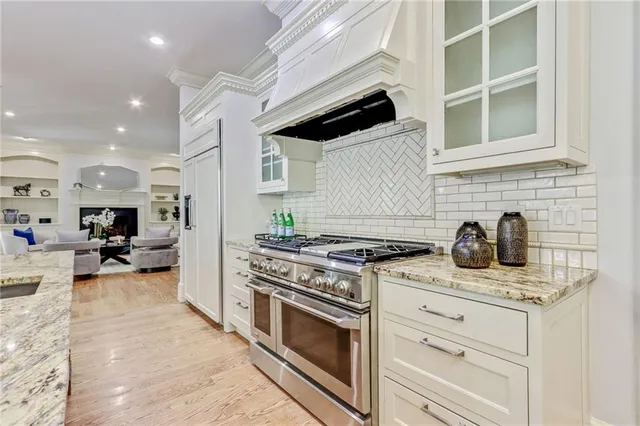 a kitchen with a stove and a sink