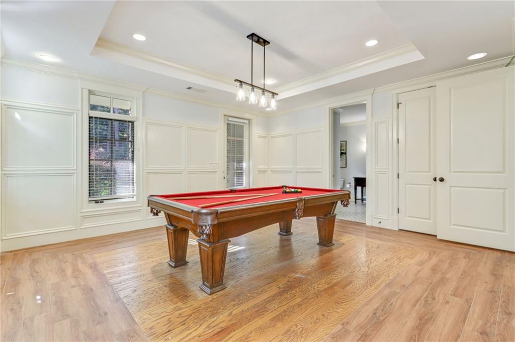 4227 Peachtree Dunwoody Road Atlanta, GA 30342 - Photo 38 of 44 a room with pool table and windows