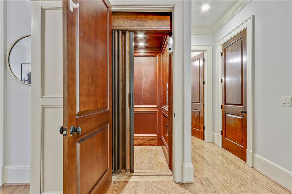4227 Peachtree Dunwoody Road Atlanta, GA 30342 - Photo 10 of 44 a view of a bathroom from the hallway
