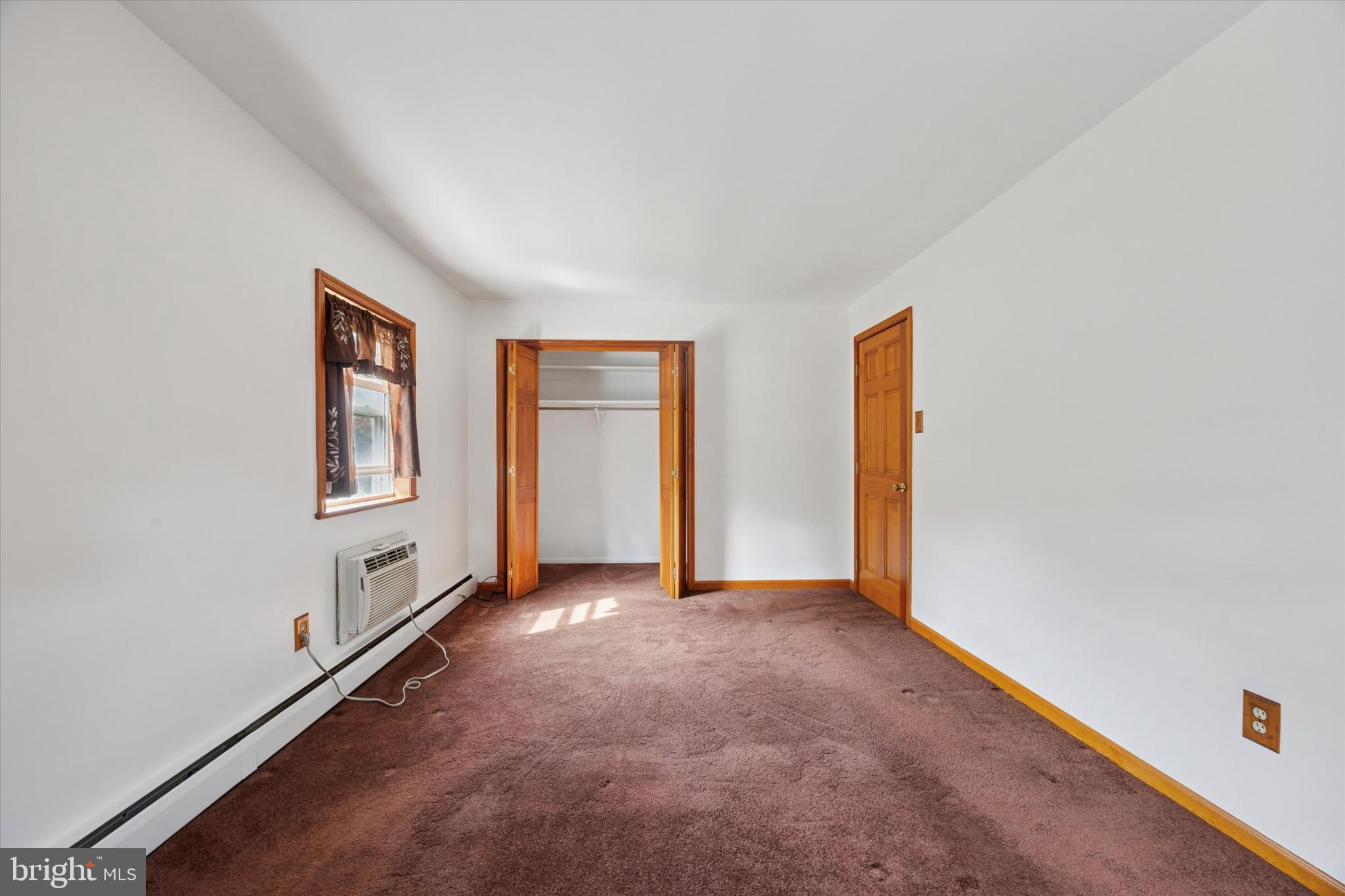 354 South Swarthmore Avenue, Unit B3 Swarthmore, PA 19081 - Photo 11 of 25 an empty room with windows