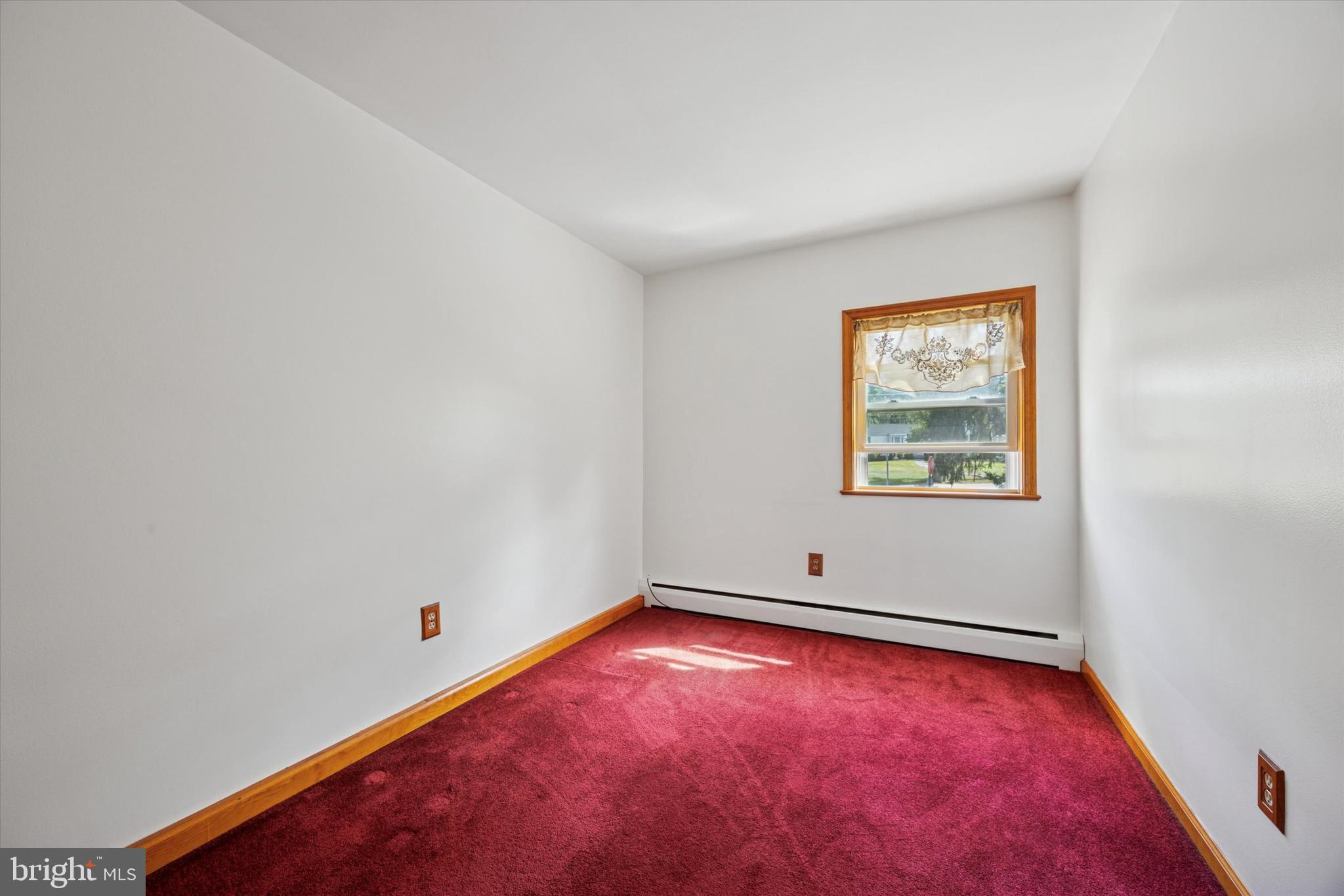 354 South Swarthmore Avenue, Unit B3 Swarthmore, PA 19081 - Photo 14 of 25 an empty room with windows