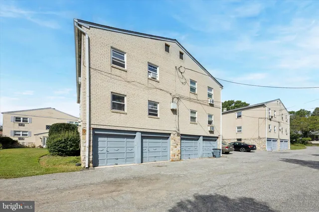 a front view of a building with streets