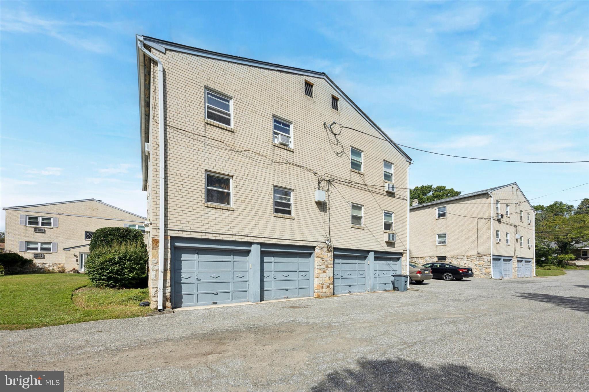 354 South Swarthmore Avenue, Unit B3 Swarthmore, PA 19081 - Photo 2 of 25 a front view of a building with streets