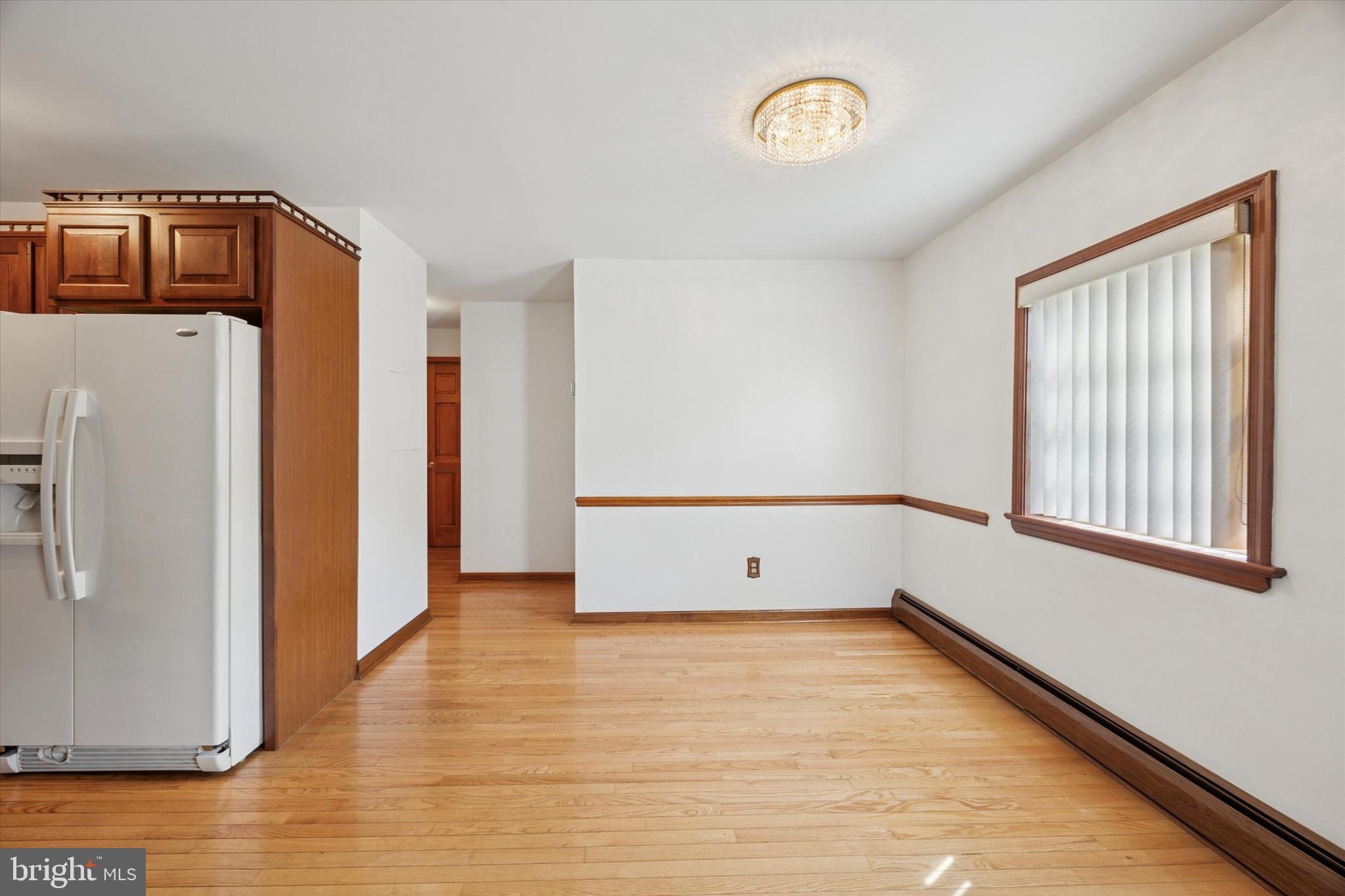 354 South Swarthmore Avenue, Unit B3 Swarthmore, PA 19081 - Photo 4 of 25 a view of an empty room with a window