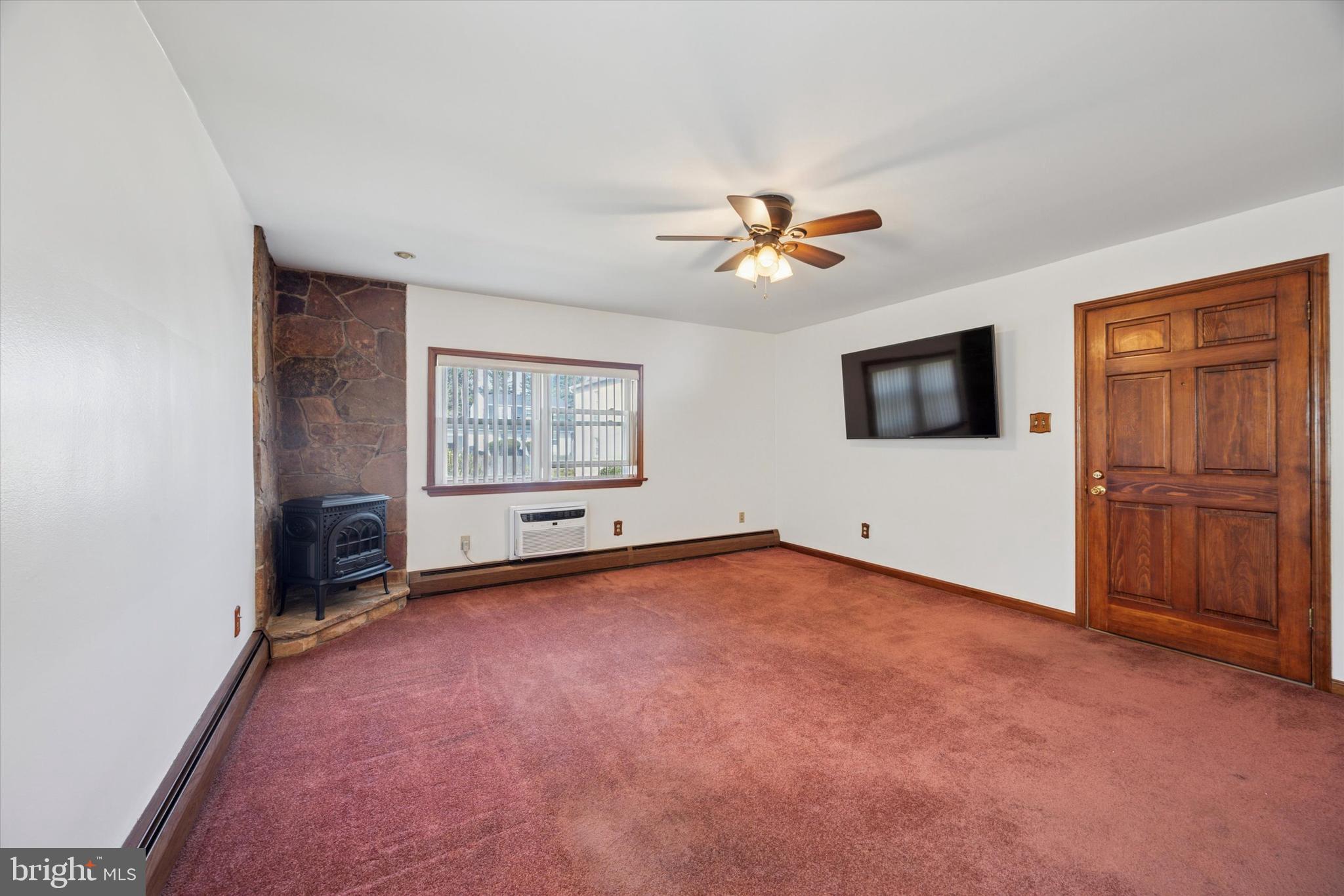 354 South Swarthmore Avenue, Unit B3 Swarthmore, PA 19081 - Photo 8 of 25 a view of an empty room with a window