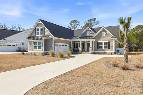 front view of a house with a patio