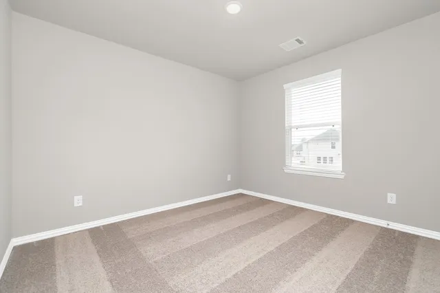 a bathroom with a sink toilet and a mirror