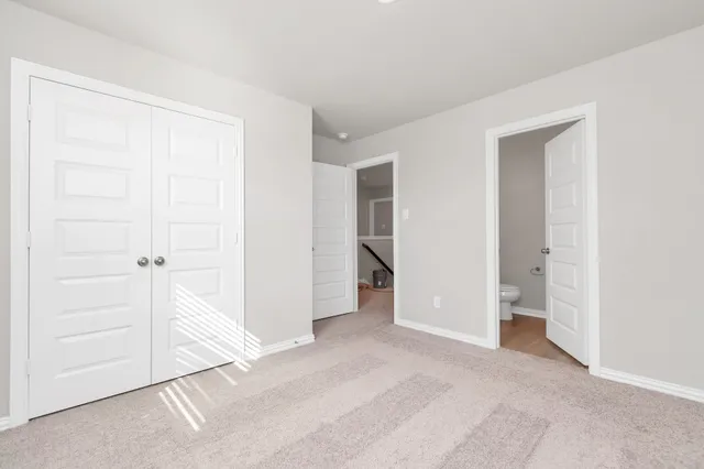 a bathroom with a shower sink and mirror