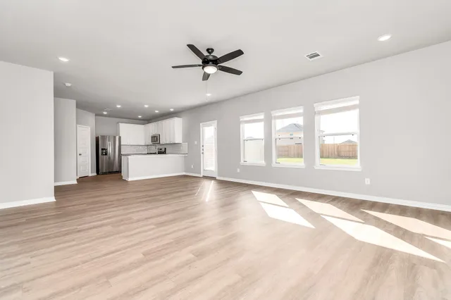 a terrace with outdoor seating and city view