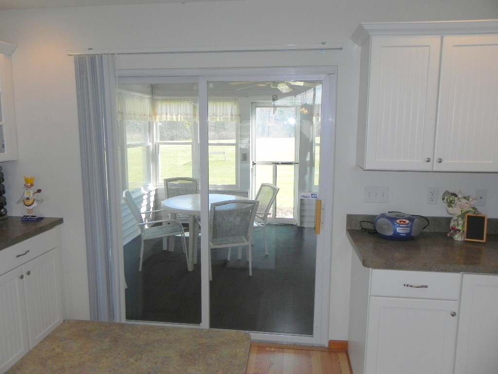 567 Baintree Road Lake Summerset, IL 61019 - Photo 15 of 25 a kitchen with sink and refrigerator