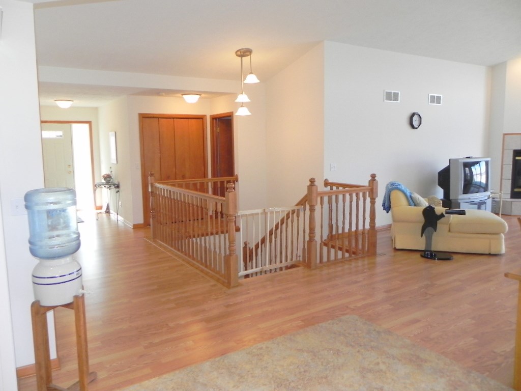 567 Baintree Road Lake Summerset, IL 61019 - Photo 18 of 25 a view of a livingroom with furniture and staircase