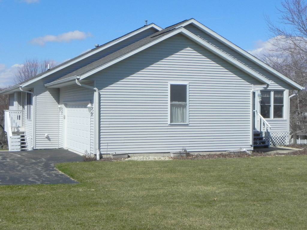 567 Baintree Road Lake Summerset, IL 61019 - Photo 5 of 25 a view of a house with a yard