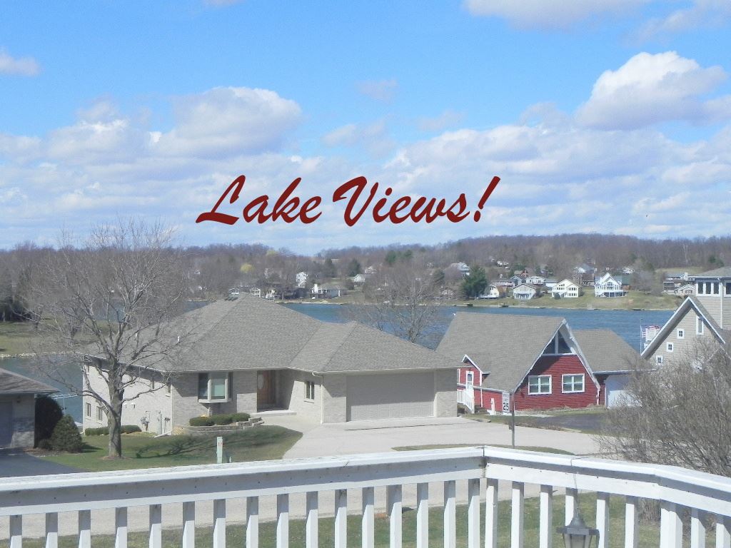 567 Baintree Road Lake Summerset, IL 61019 - Photo 7 of 25 a view of a street with a building in the background