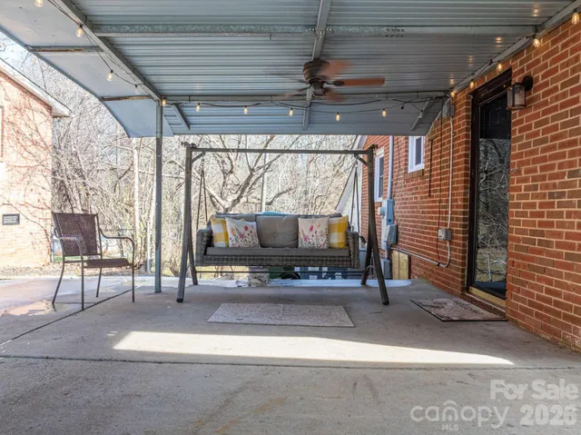 a aerial view of house with mountain view